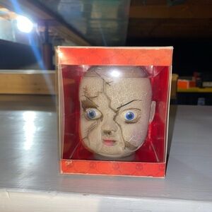 Creepy Cracked Doll Head with Blue Eyes